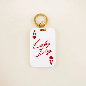 Lucky Dog Pet Tag in white acrylic with red details and solid brass hardware | Shop Freshwater
