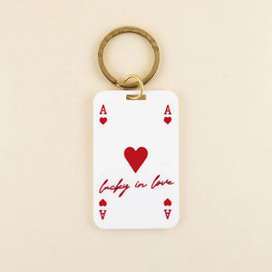 Lucky in Love Keychain in white acrylic and red color-fill with solid brass hardware | Shop Freshwater